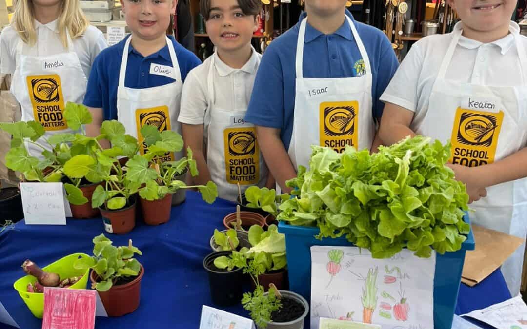 Young Marketeers Plymouth Market Day 2026 - children proudly display their produce